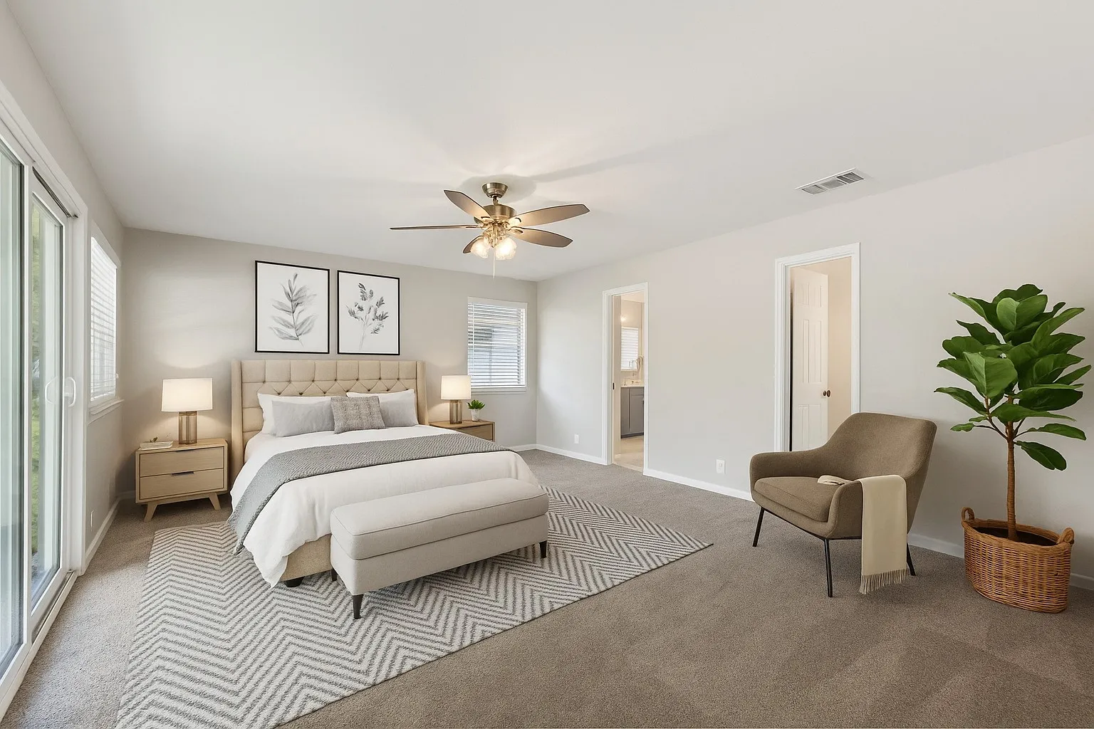 Bedroom featuring carpet flooring, a ceiling fan, connected bathroom, and access to exterior
