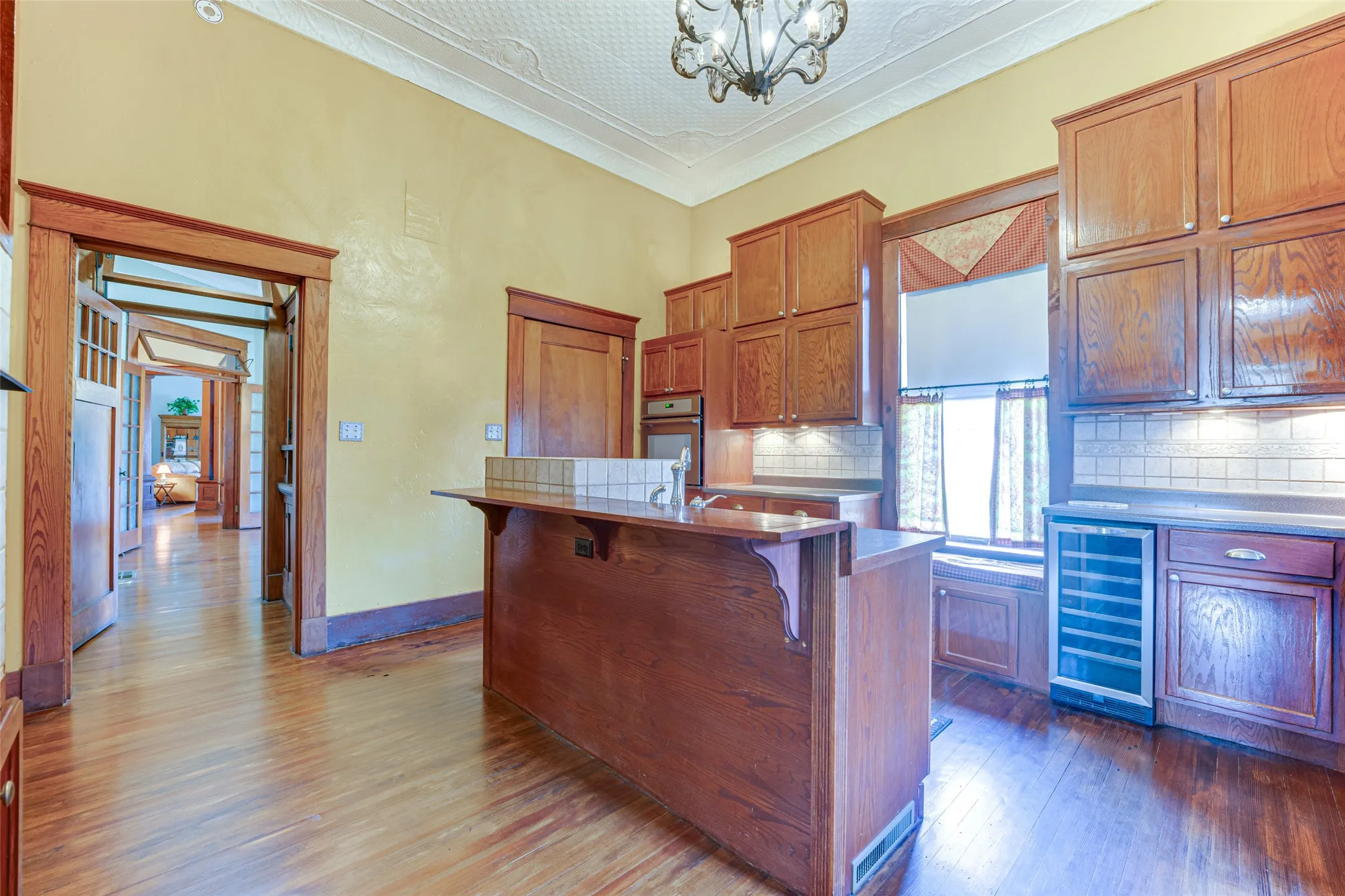 View of Butler's Pantry to Dining Room and Kitchen