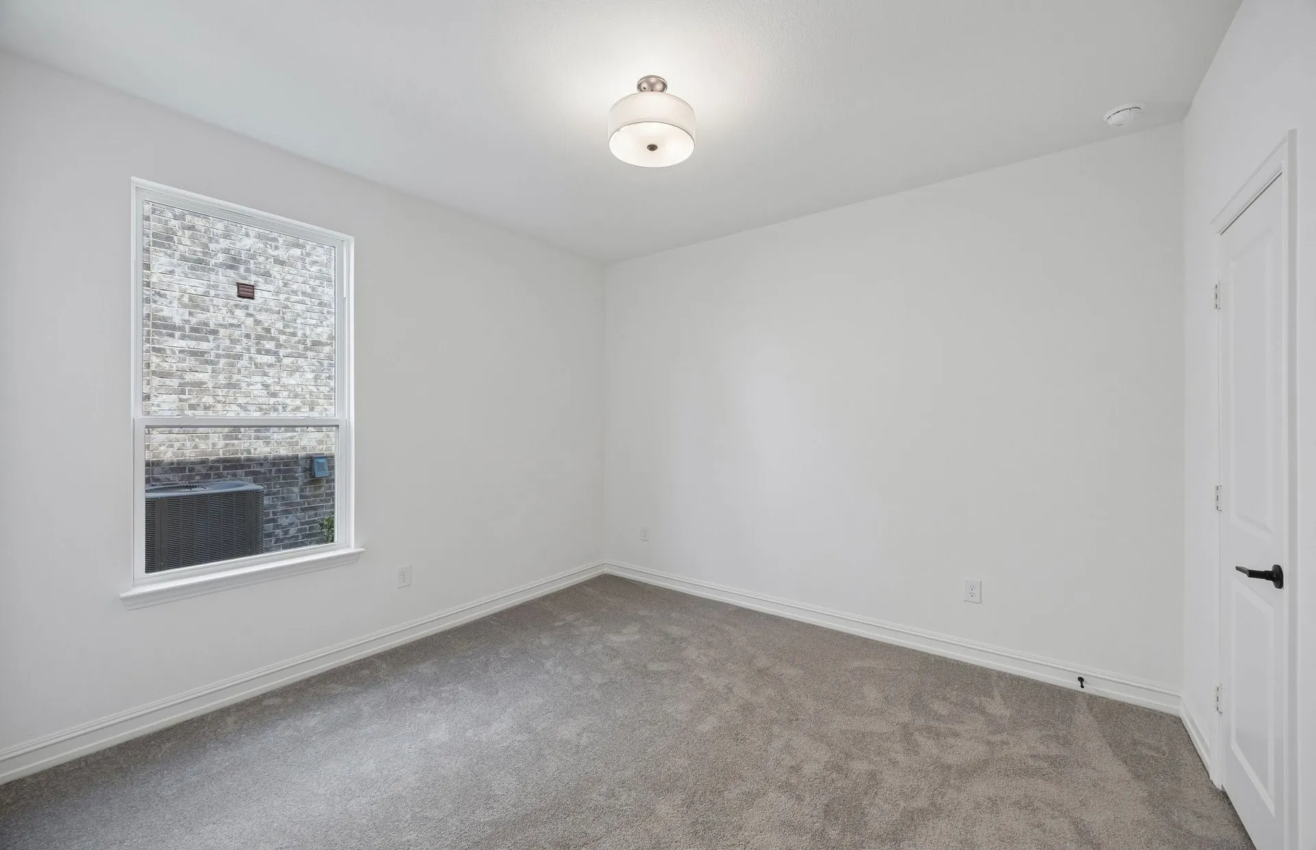 Spacious secondary bedroom on first level