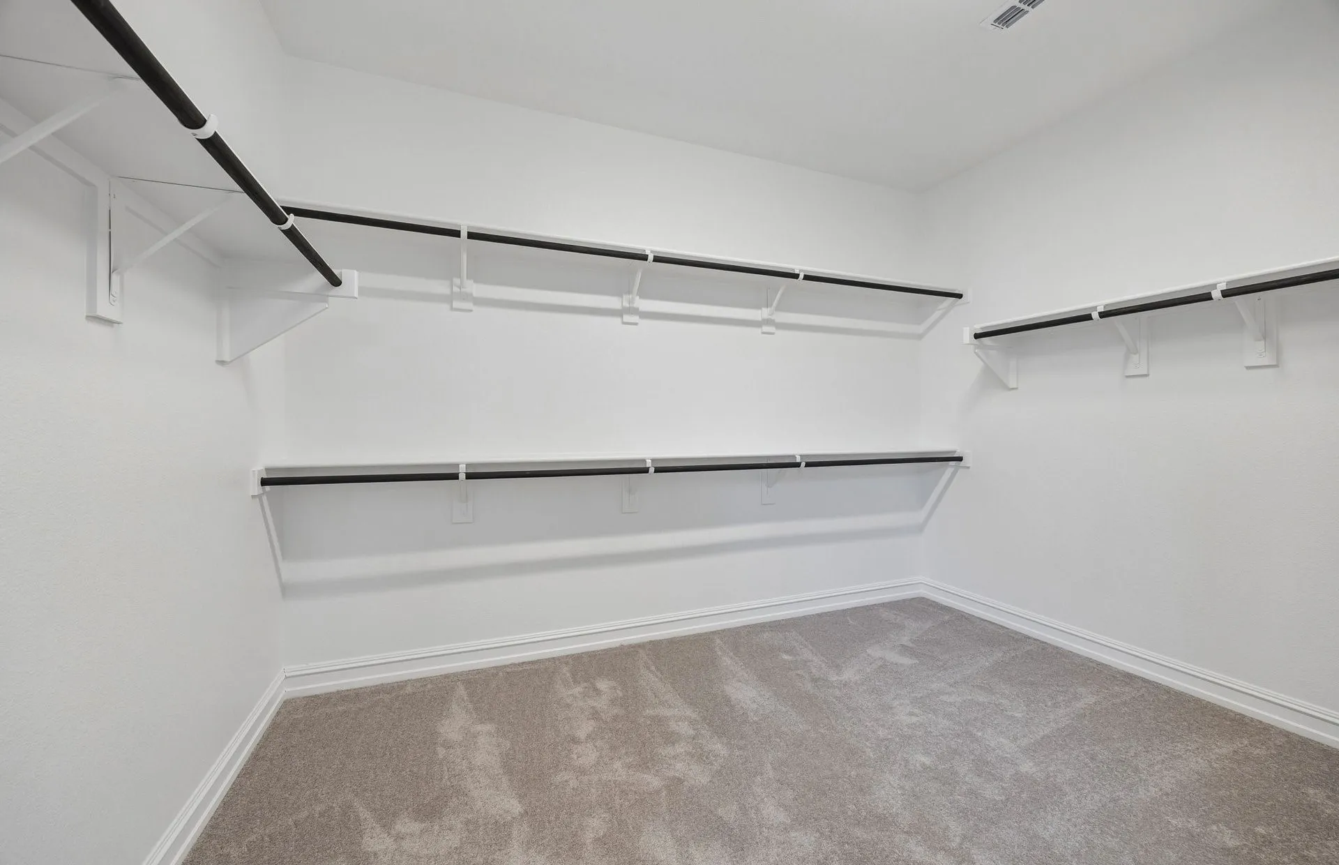 Walk-in closet in primary suite