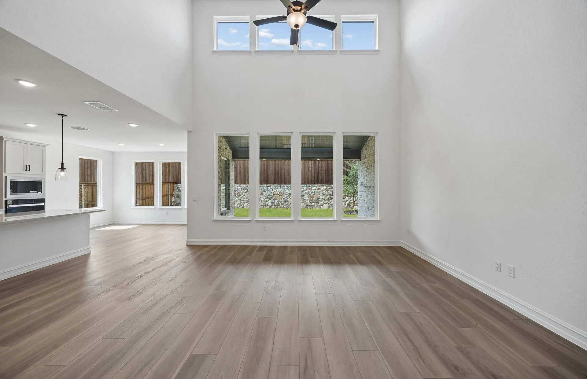 Two story windows in living room