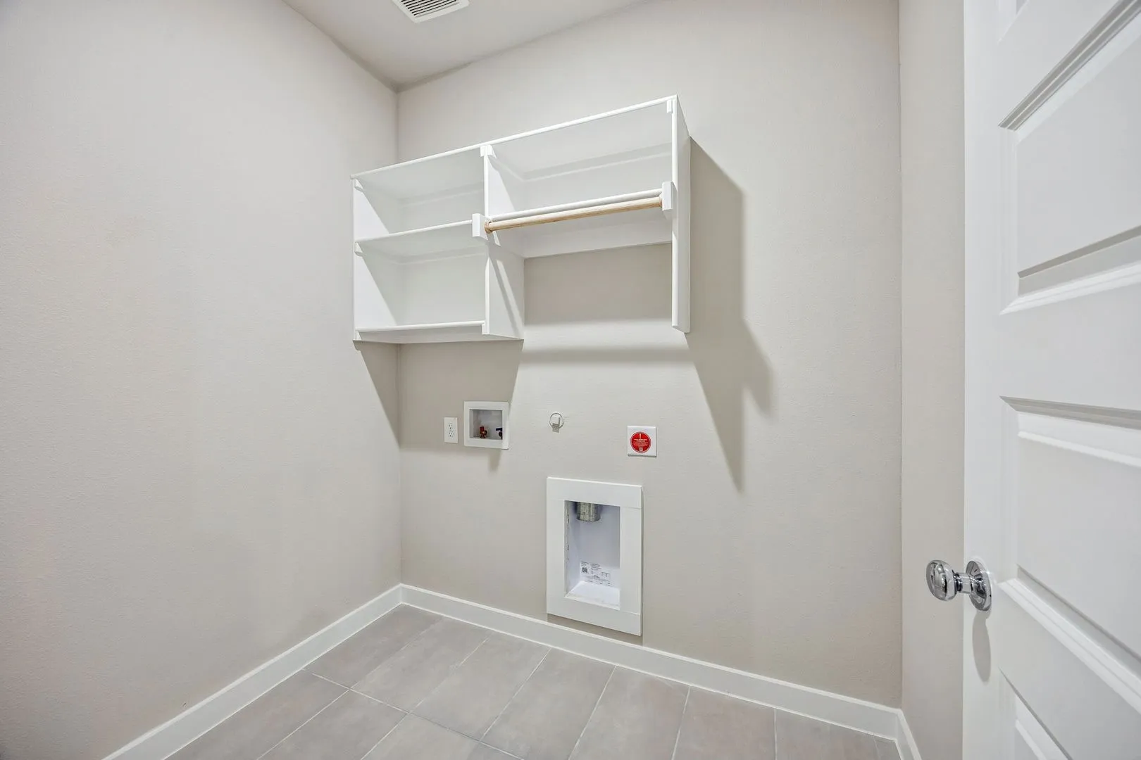 Utility Room in the Willow home plan by Trophy Signature Homes – REPRESENTATIVE PHOTO