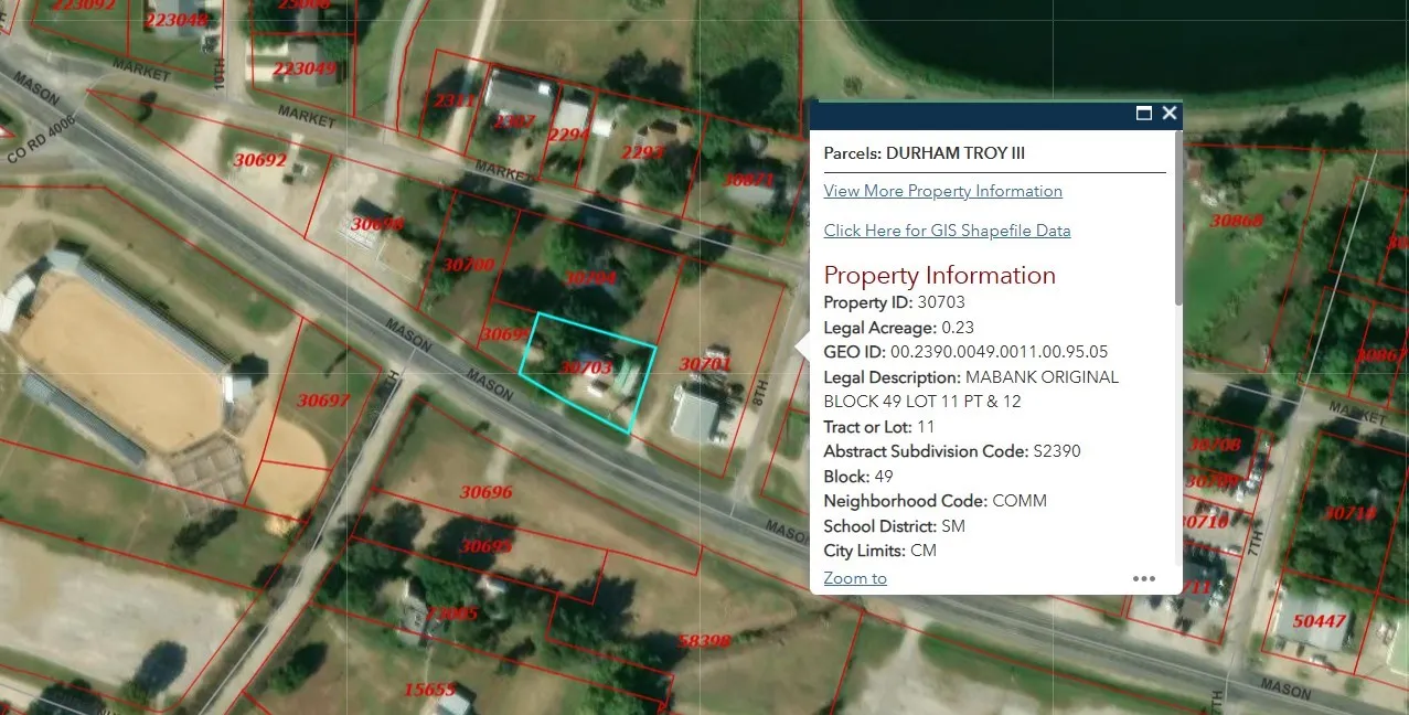 Aerial map of property and surrounding area with property boundaries highlighted