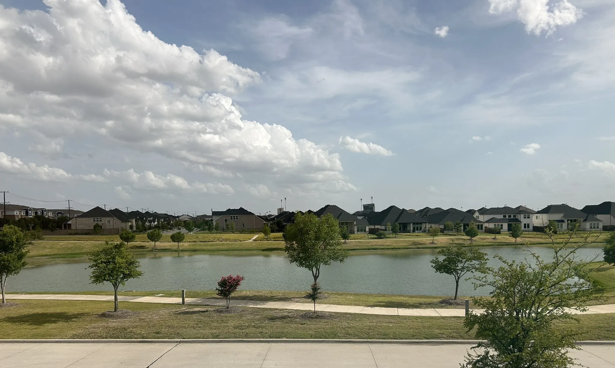 Your front yard view! Enjoy this pond and walking trails right outside your door!