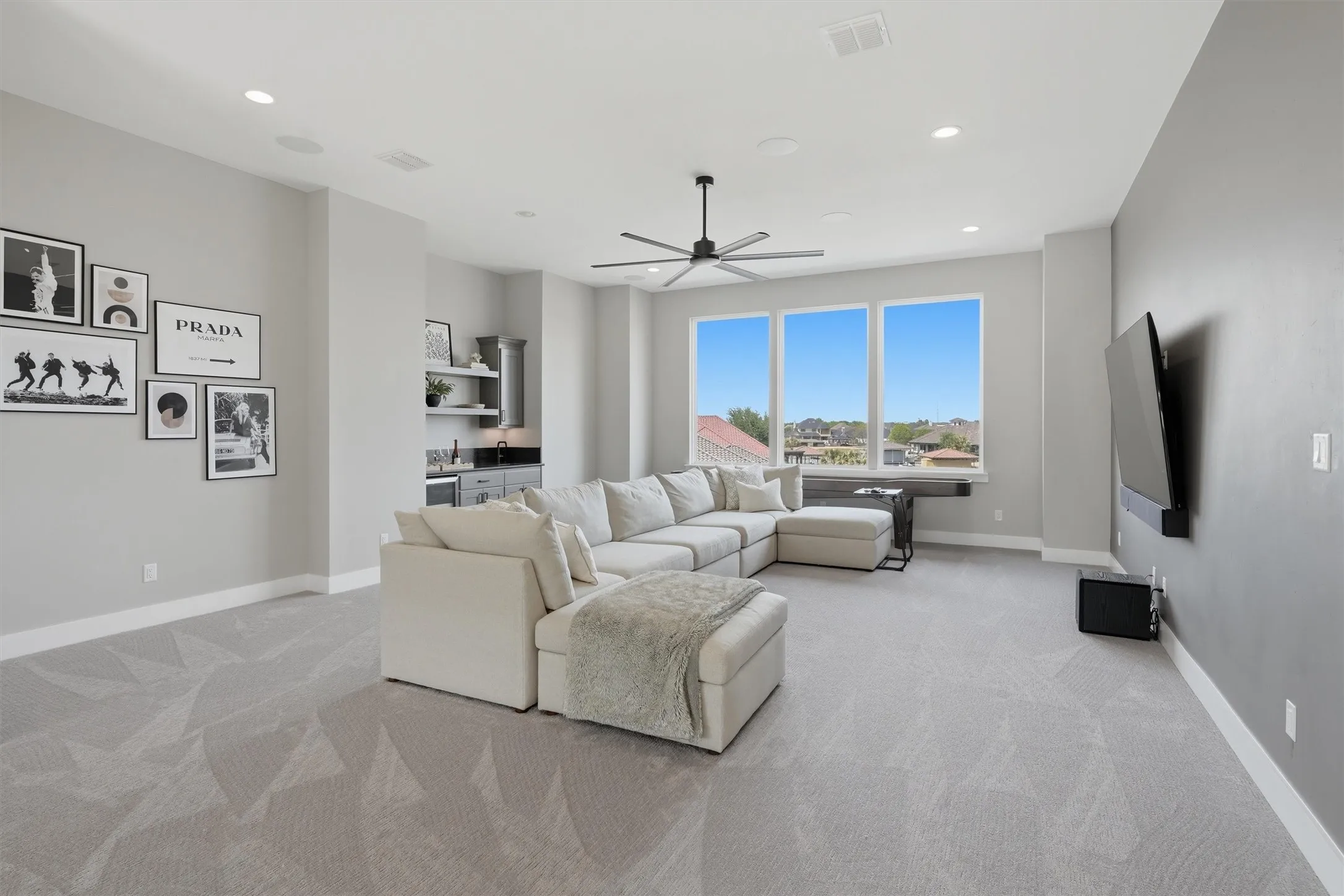 Living and game room. Wet bar