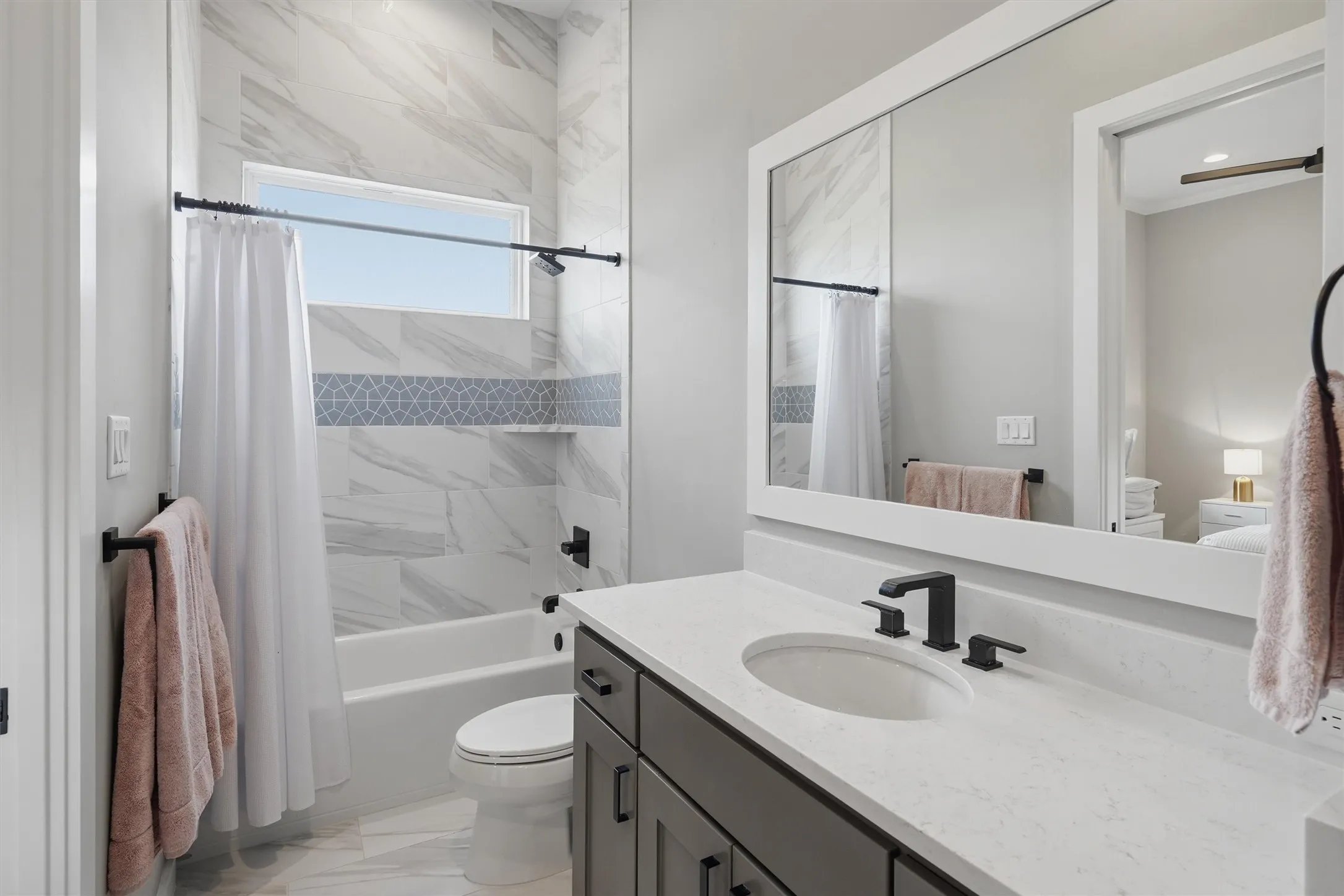 Bedroom 4 Bathroom with vanity and shower / bath combo & walk in closet