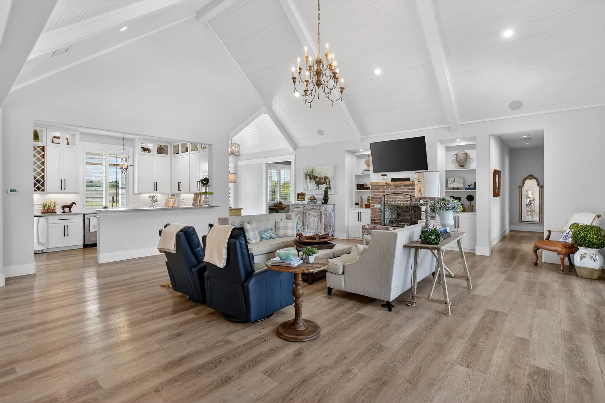 Notice the entertaining area just beyond the grand living space. This creates the perfect set-up for your next gathering.