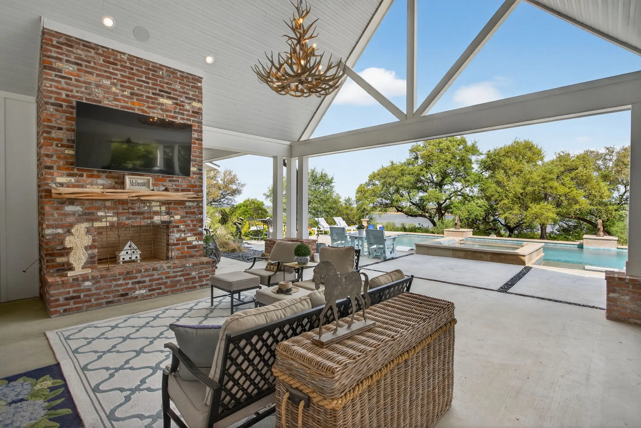 As you step out of the main living area, you enter the BEST part of this property! This porch was designed to be enjoyed. Watch the game, do some bird watching, see the boats whizzing by, and best of all, take in some of the most amazing sunsets off to the left. Because this home faces South, the back looks North thus providing a shady area all day long.