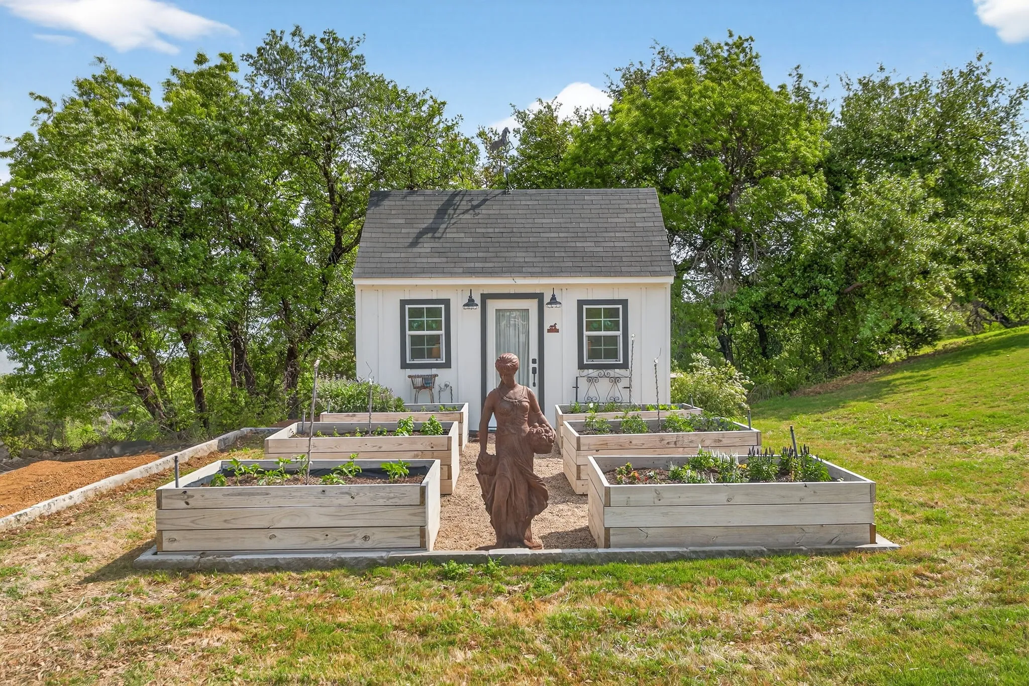 There is even a raised-bed vegetable and herb garden. And, this little She Shed is FANTASTIC! You will HAVE to see this.