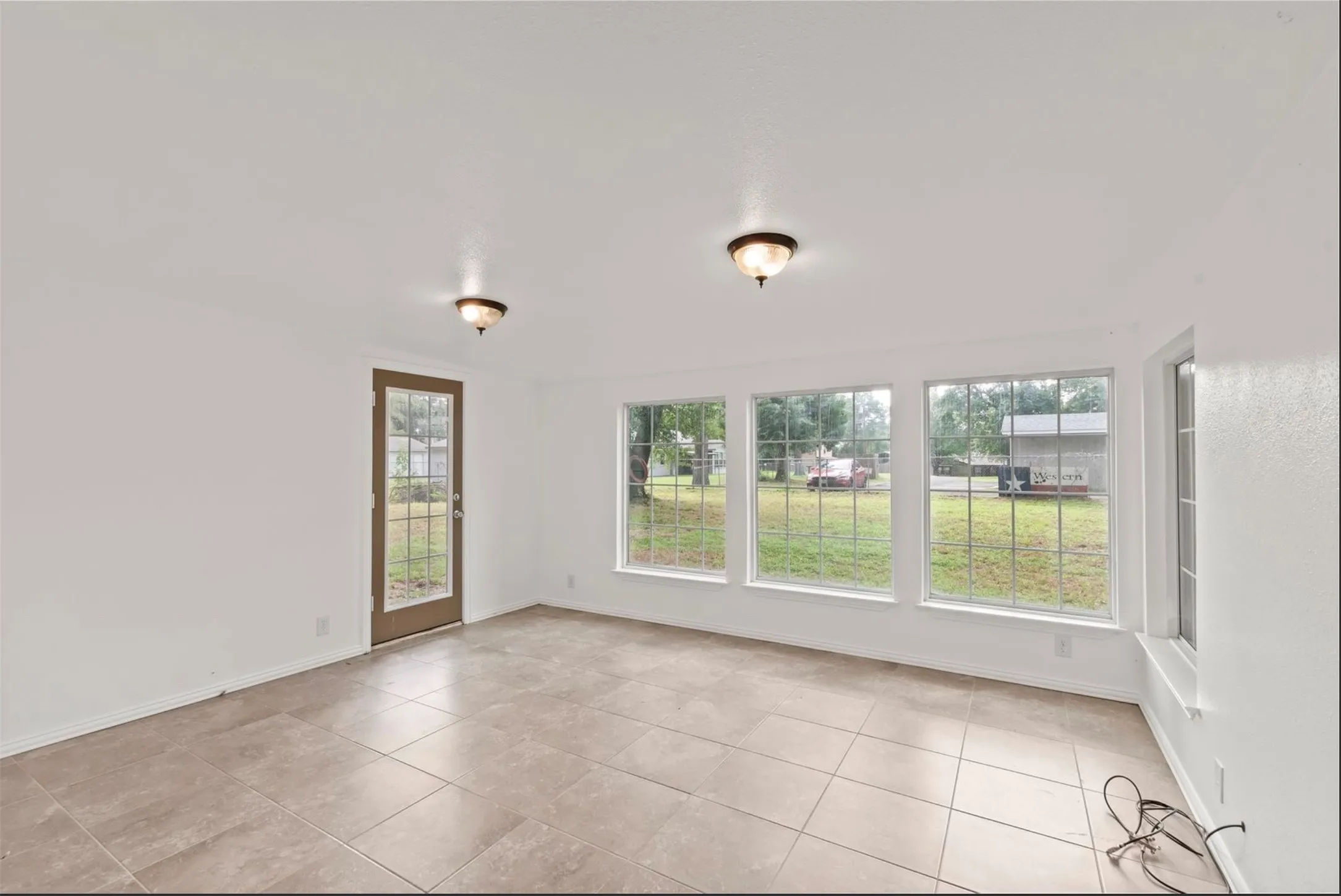 living area with access to backyard