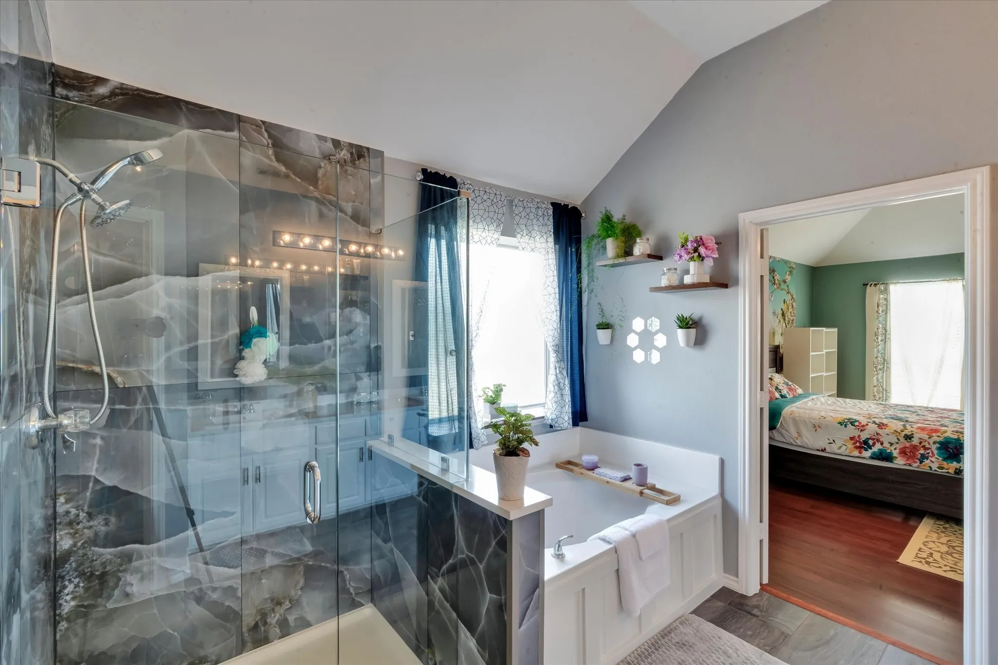 Upgraded shower and separate tub and walk in closet