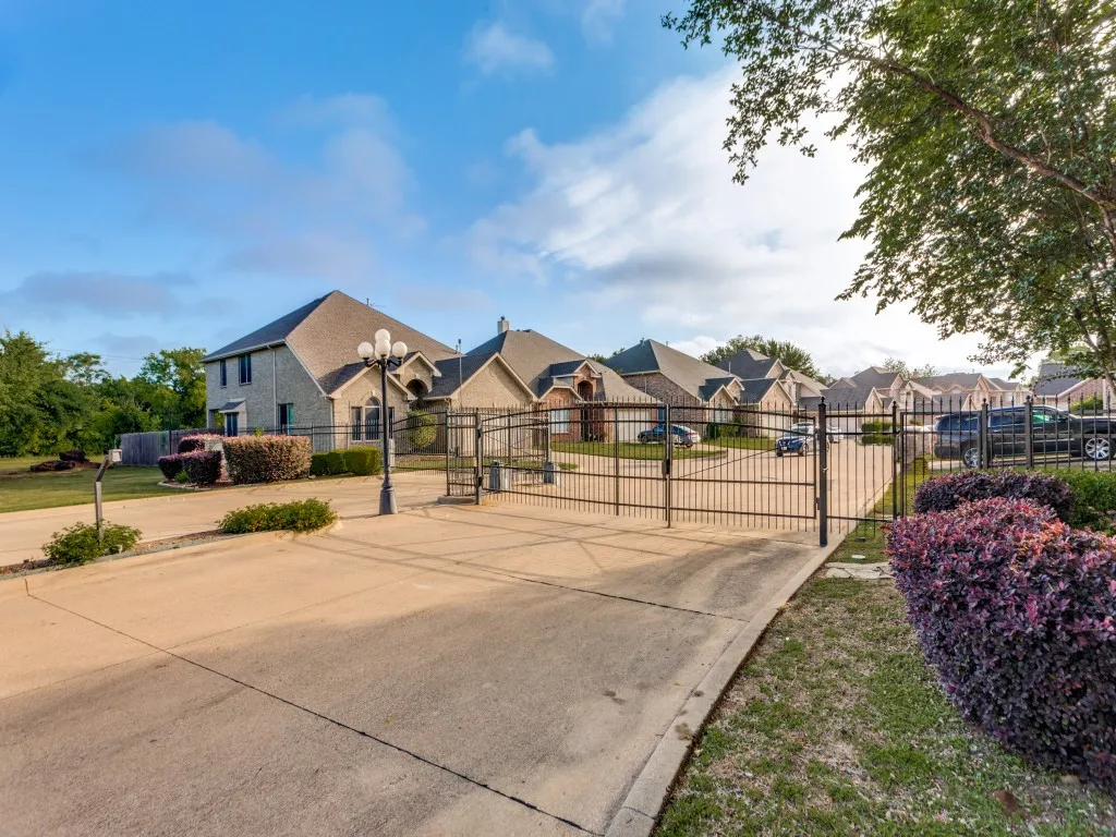 Gated entrance to neighborhood, concrete streets, nice!