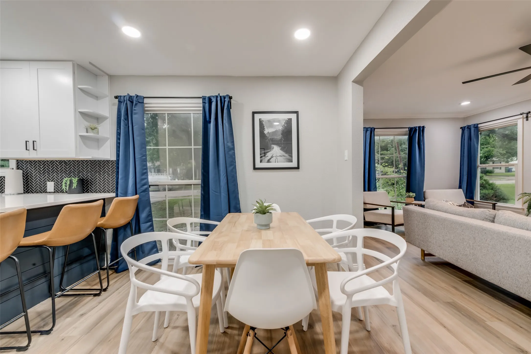 Dining space featuring recessed lighting, light wood-type flooring, and ceiling fan