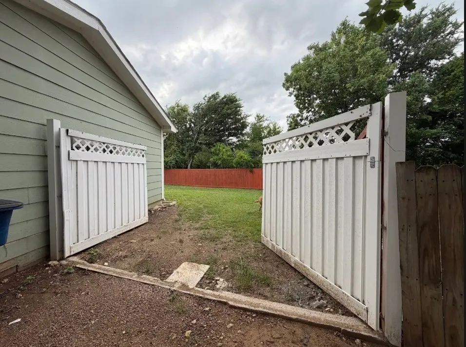 Fence Open into the back yard.