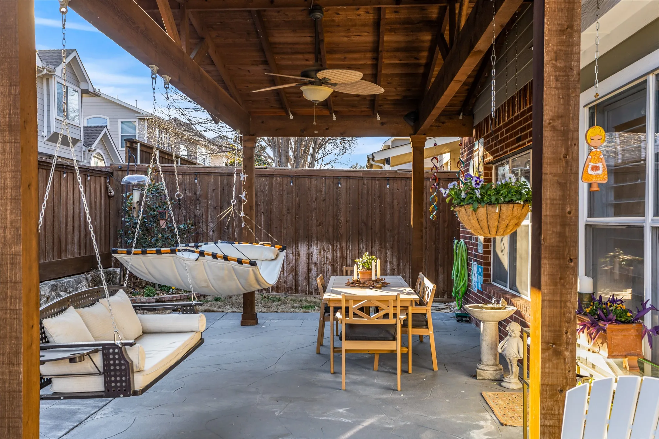 Beautiful covered porch that owners extended. The swing, hammoch and furniture on porch stay.