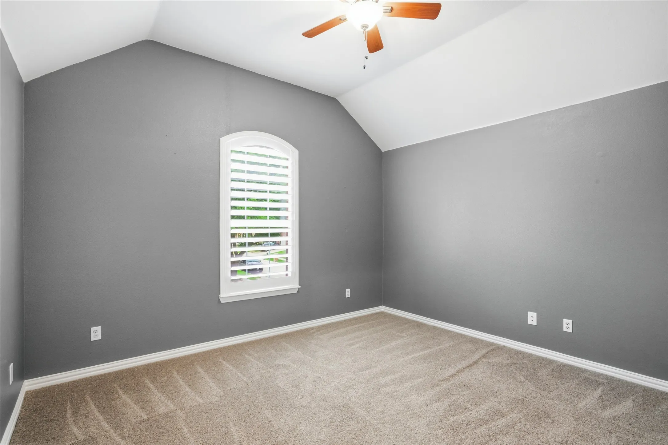 Secondary bedroom with beautiful slate color designer paint.