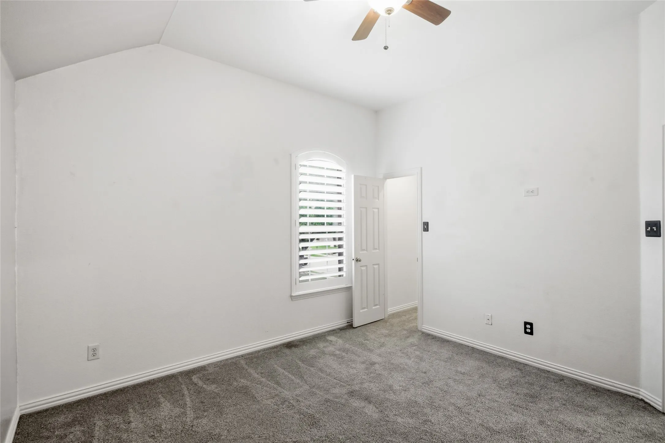 Another view of secondary bedroom with view of vaulted ceilings. All secondary bedrooms are a good size.