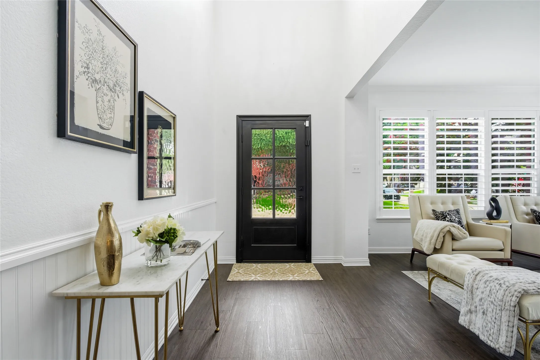 Grand entry way with soaring ceiling.