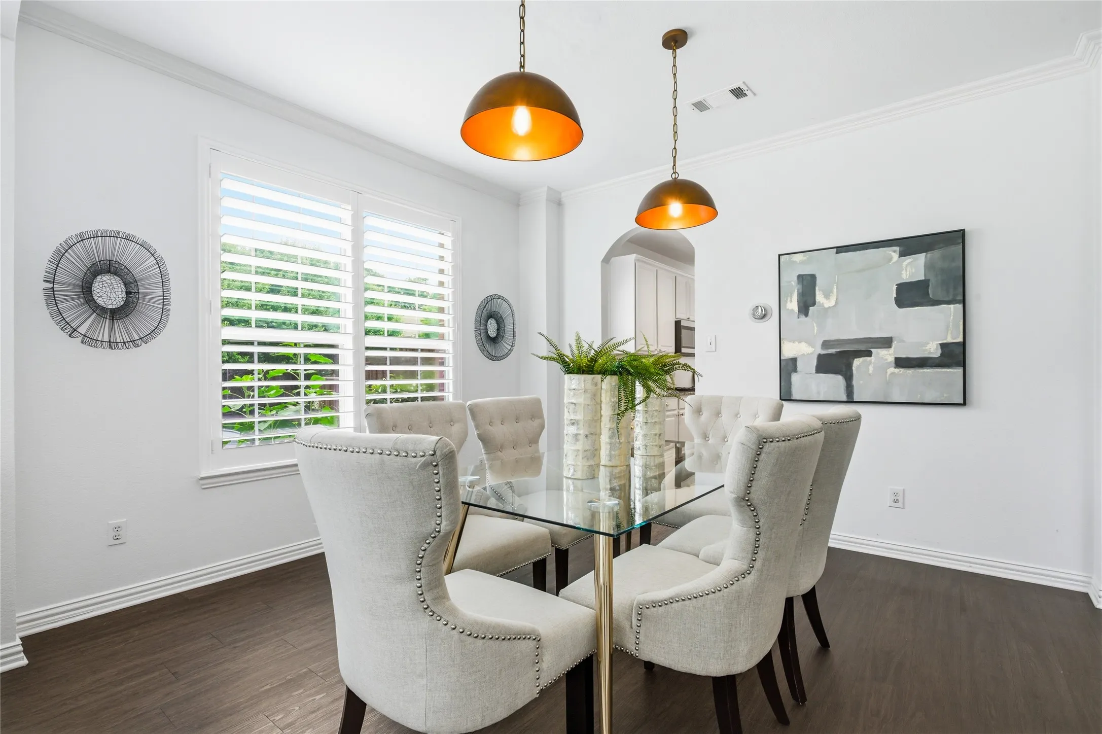 Dining area with doorway leading to kitchen.