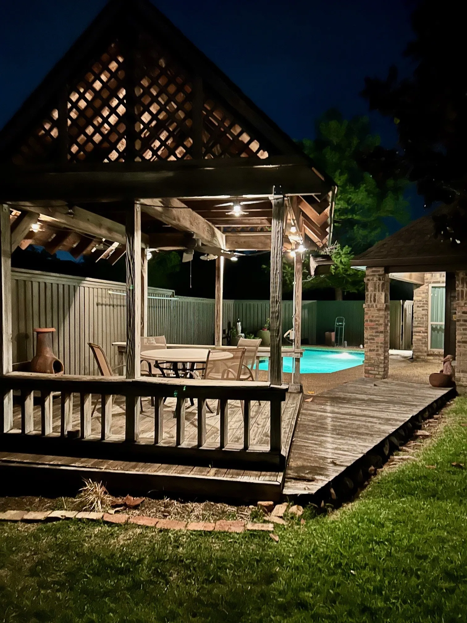 Picture of Gazebo and pool at night for summer evenings of relaxation and fun