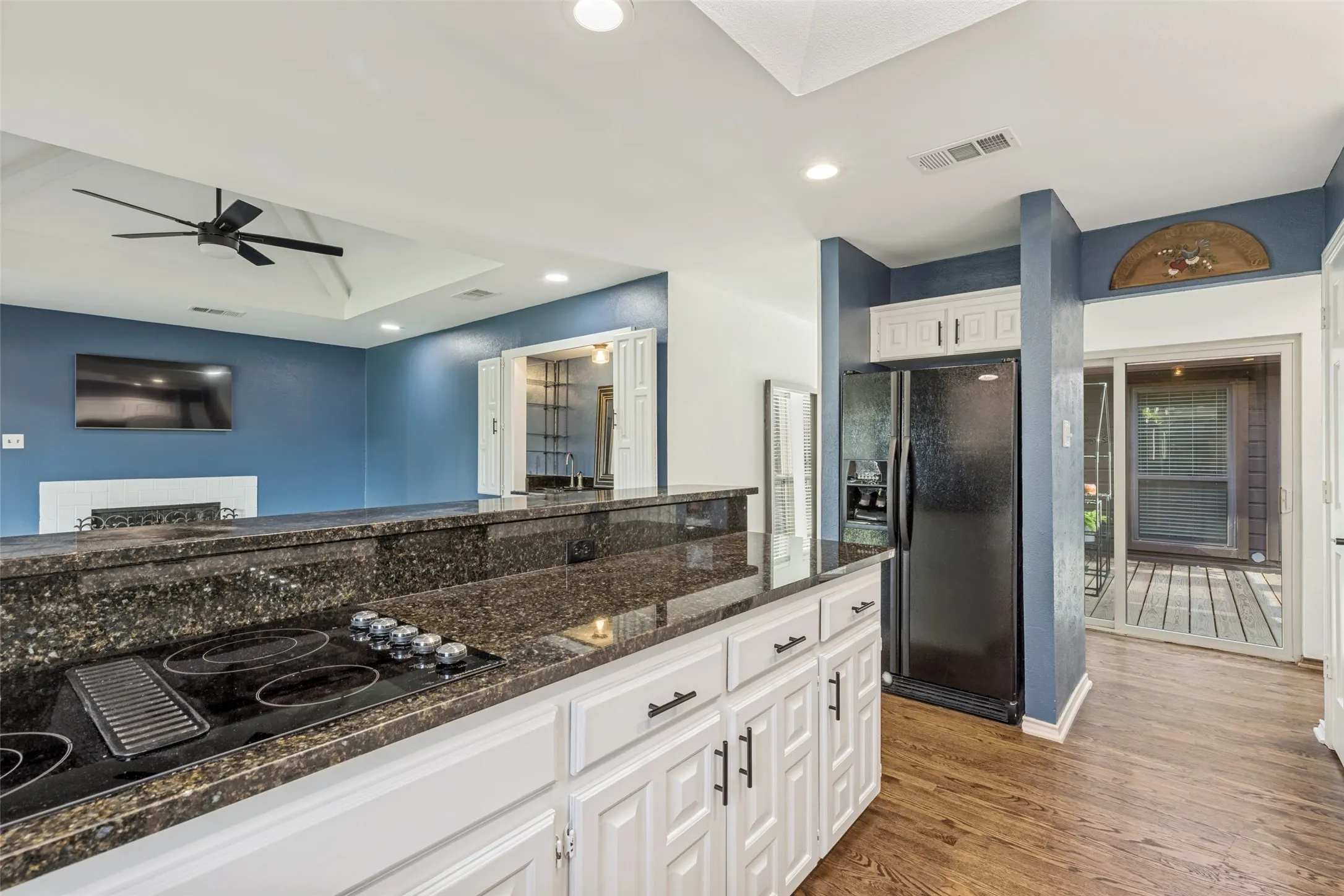 Another view of the Kitchen showing the breakfast bar