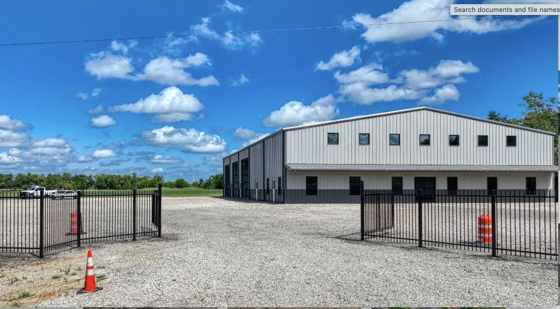 Six foot ornamental gate and fence along SH 31