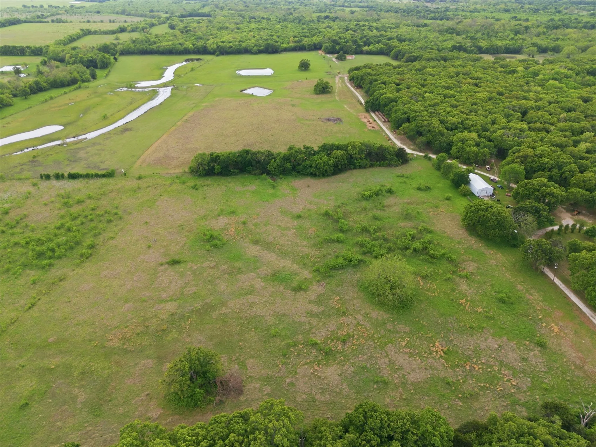 Farm For Sale in Hunt County , 639 County Road 1001, Greenville, Texas 75401, 3 Bedroom, 2 Bathroom, 2 Garage spaces, 2,032 Sqft, built in 1975, Preowned, Price $1,200,000, mls#21228192, Real Estate Agent in Greenville, Homes For Sale in Hunt county, Homes For Sale in Greenville, Realtor in Greenville Texas, Real Estate Brokerage Independent Realty Texas, Luminita Cordes Realtor