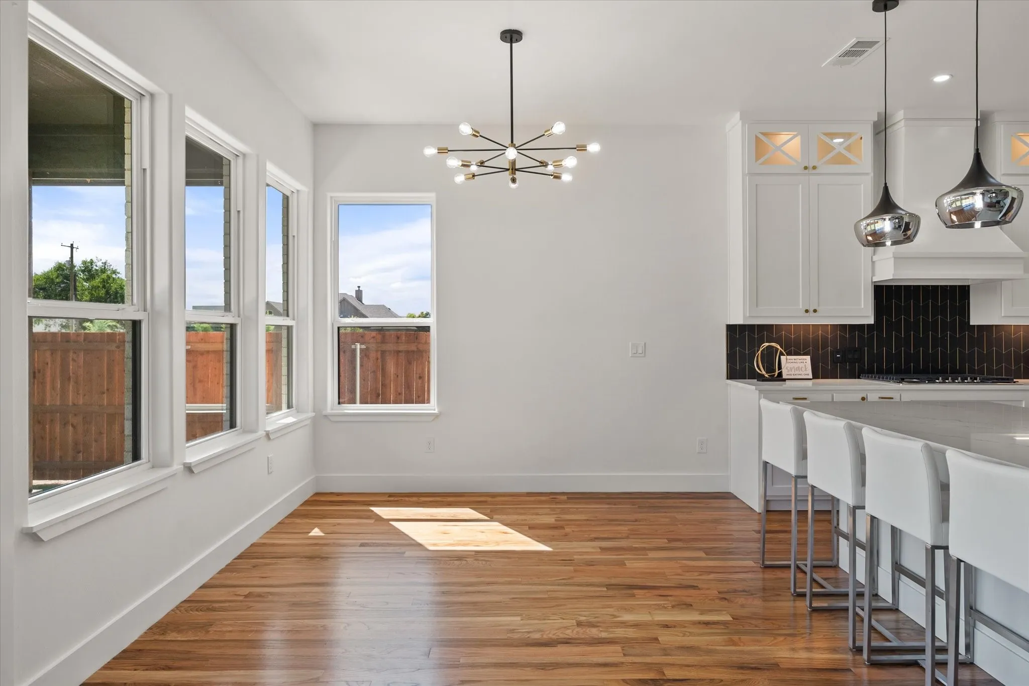 Eat in kitchen area with chandelier