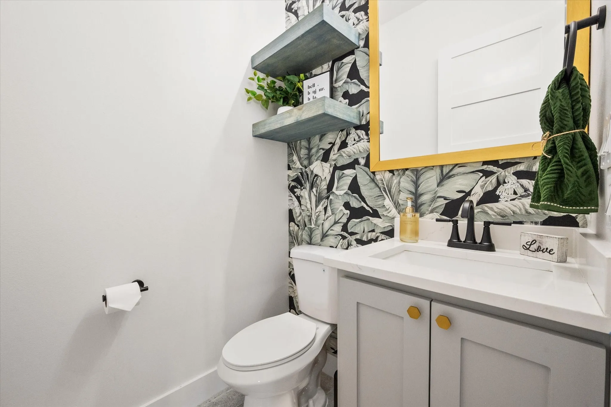 Half bathroom near the entryway of the home