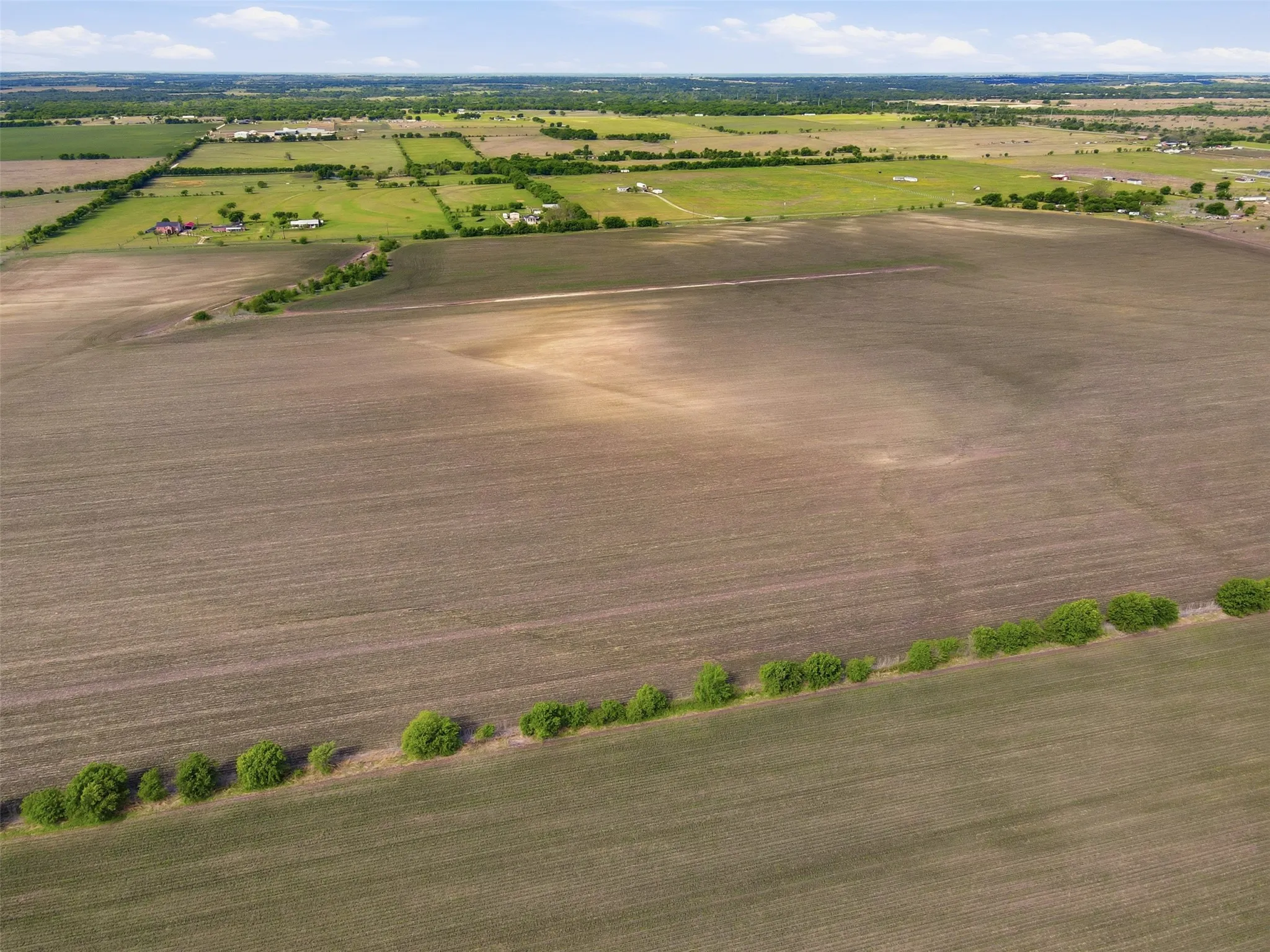 Overview of rural landscape with extensive farmland