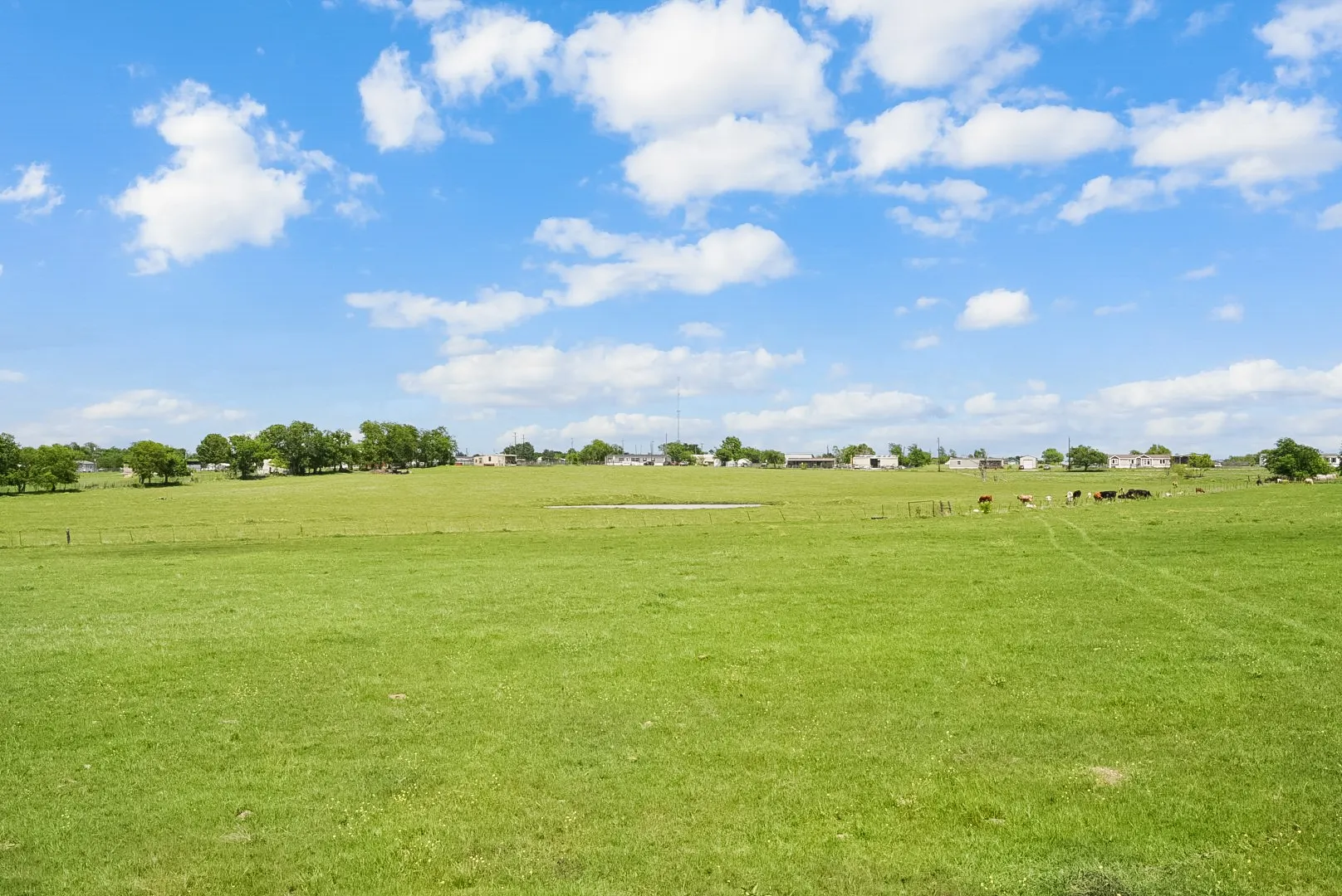 View of grassy yard with a view of countryside