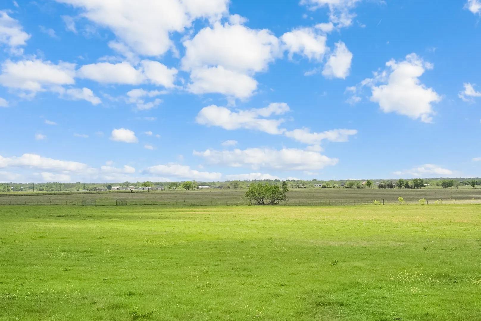 View of green lawn featuring a view of countryside