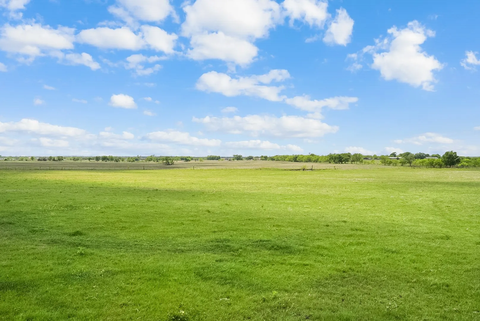 View of green lawn featuring a view of countryside