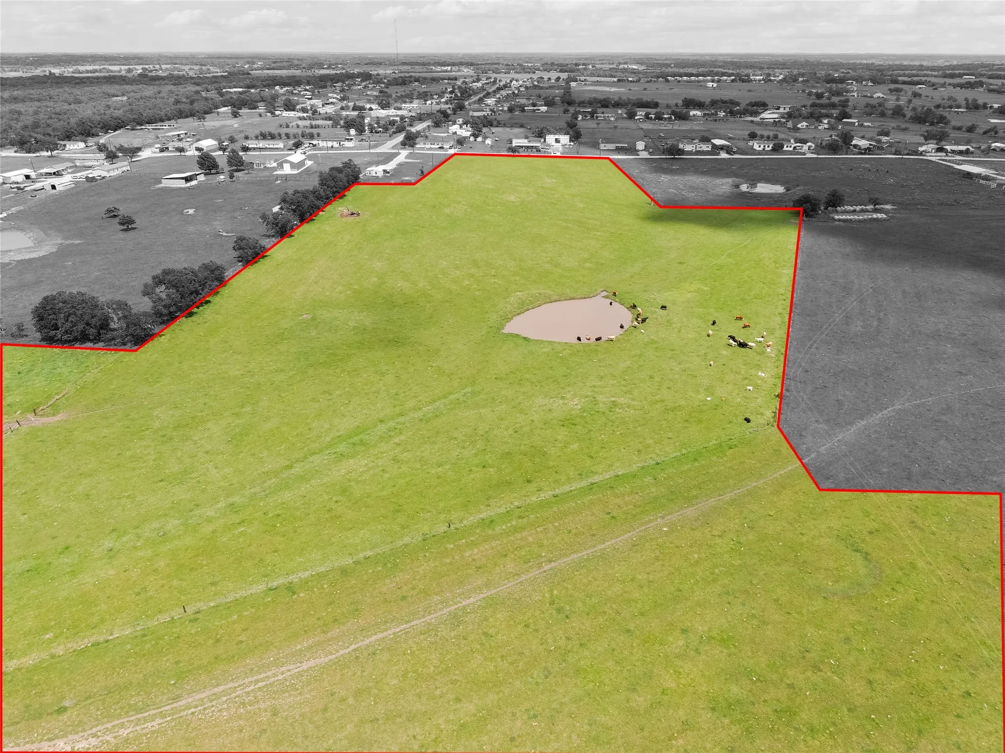 Aerial overview of property's location featuring property boundaries highlighted