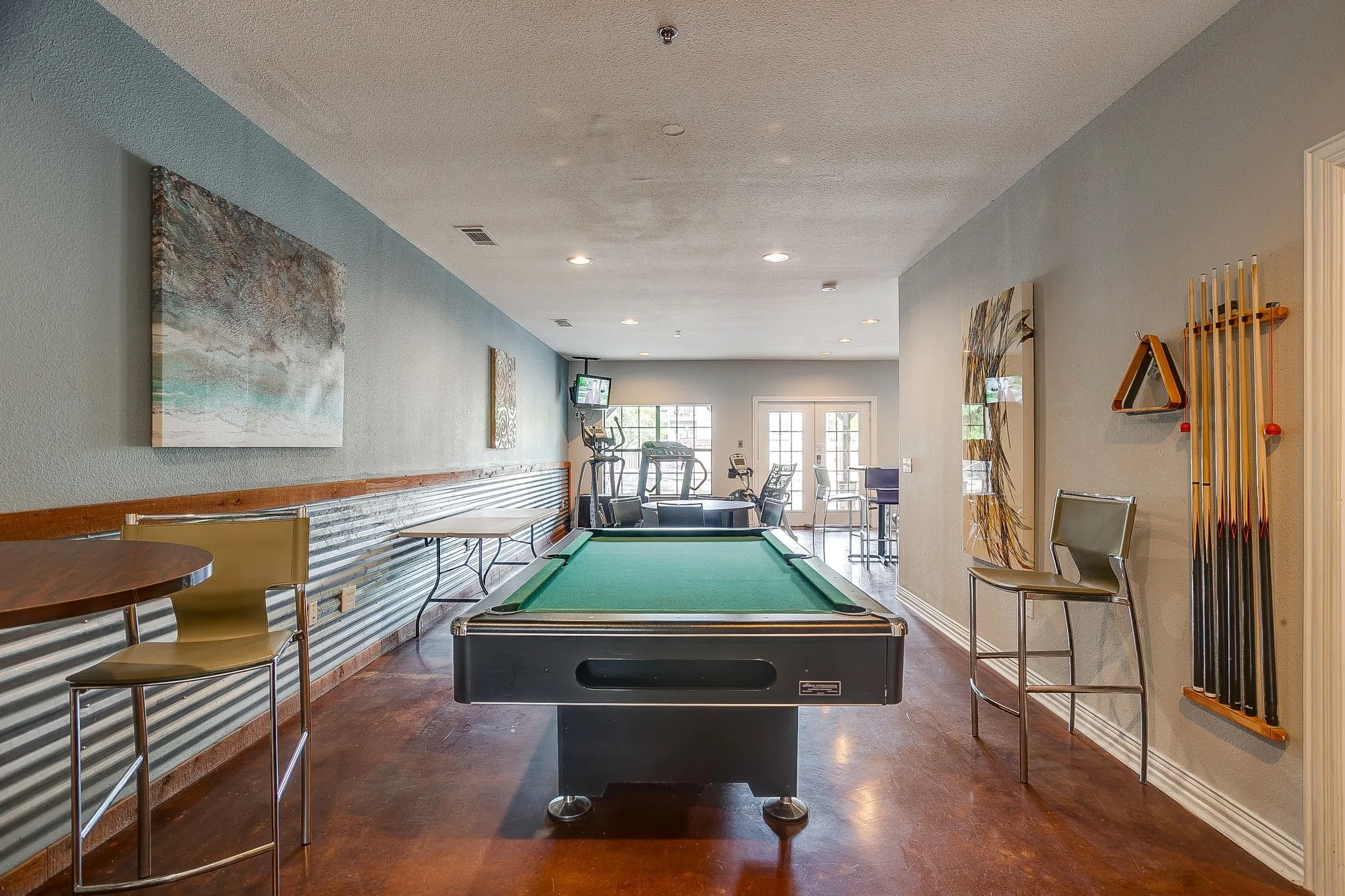 Playroom featuring french doors, billiards, and a textured ceiling