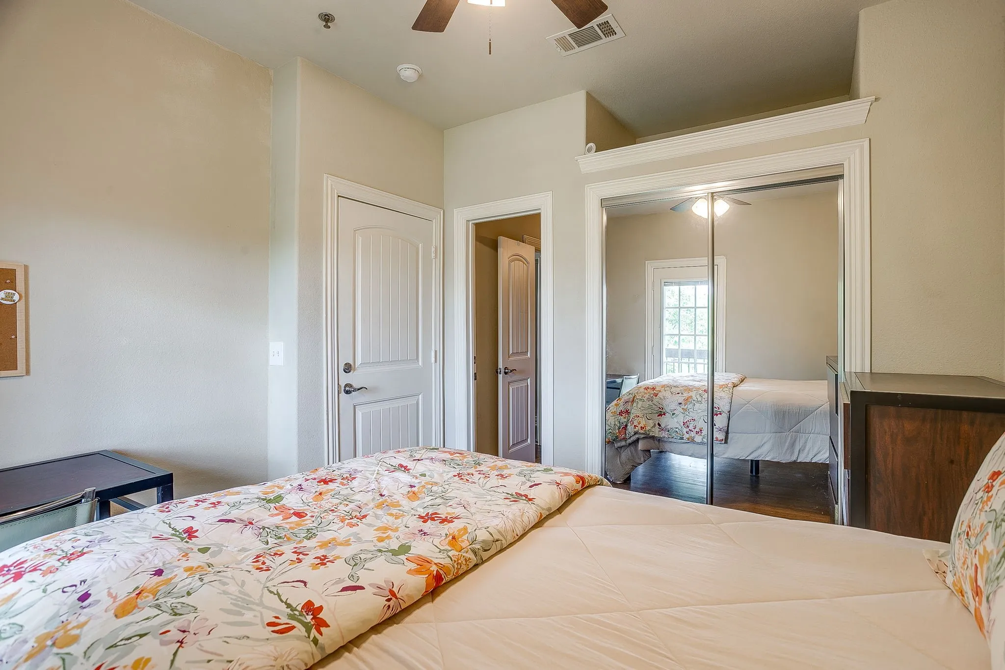 Bedroom featuring a ceiling fan and a closet