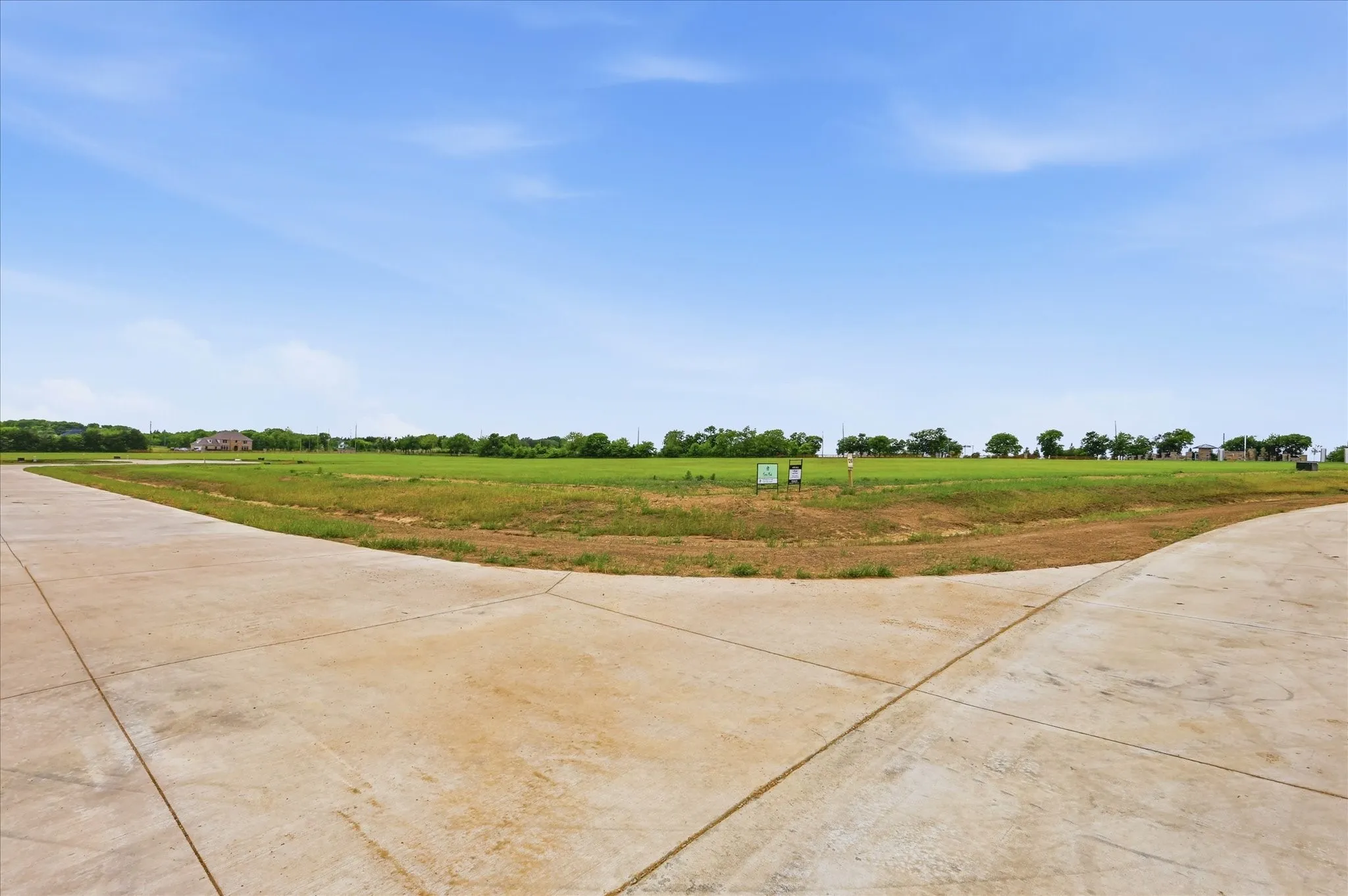 View of yard with a view of rural / pastoral area and driveway