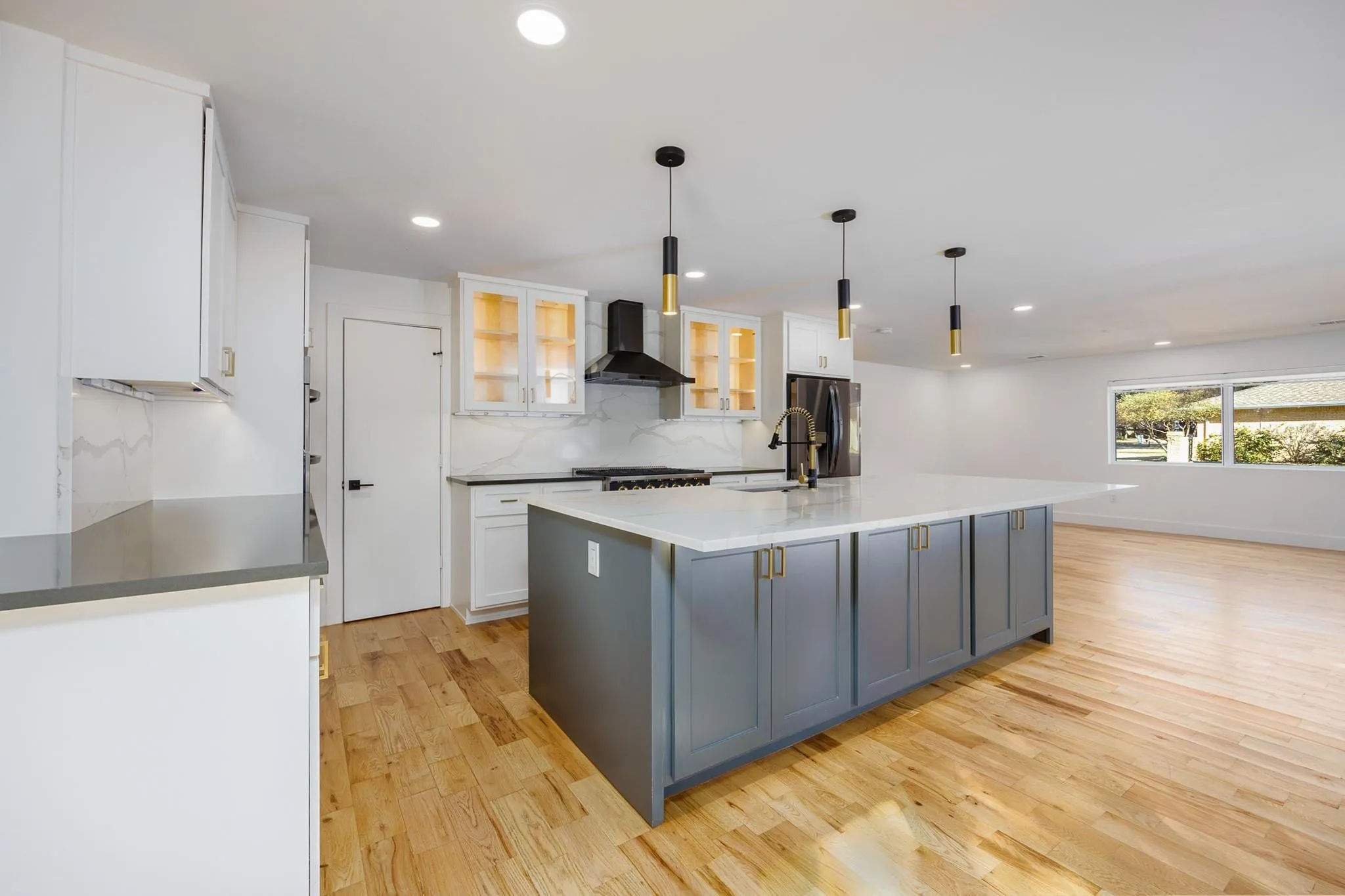 Remodeled kitchen anchored by an oversized island