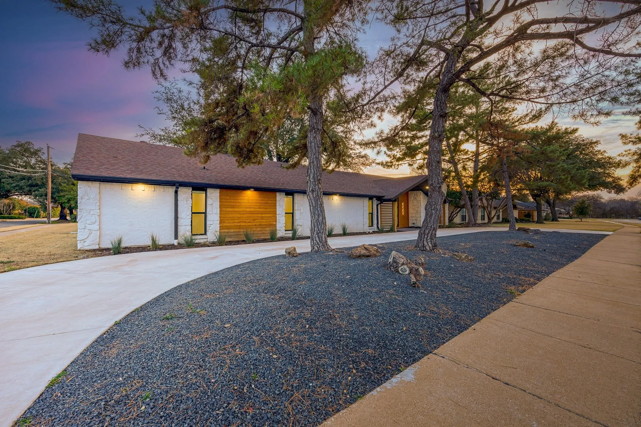 Sweeping drive and manicured frontage