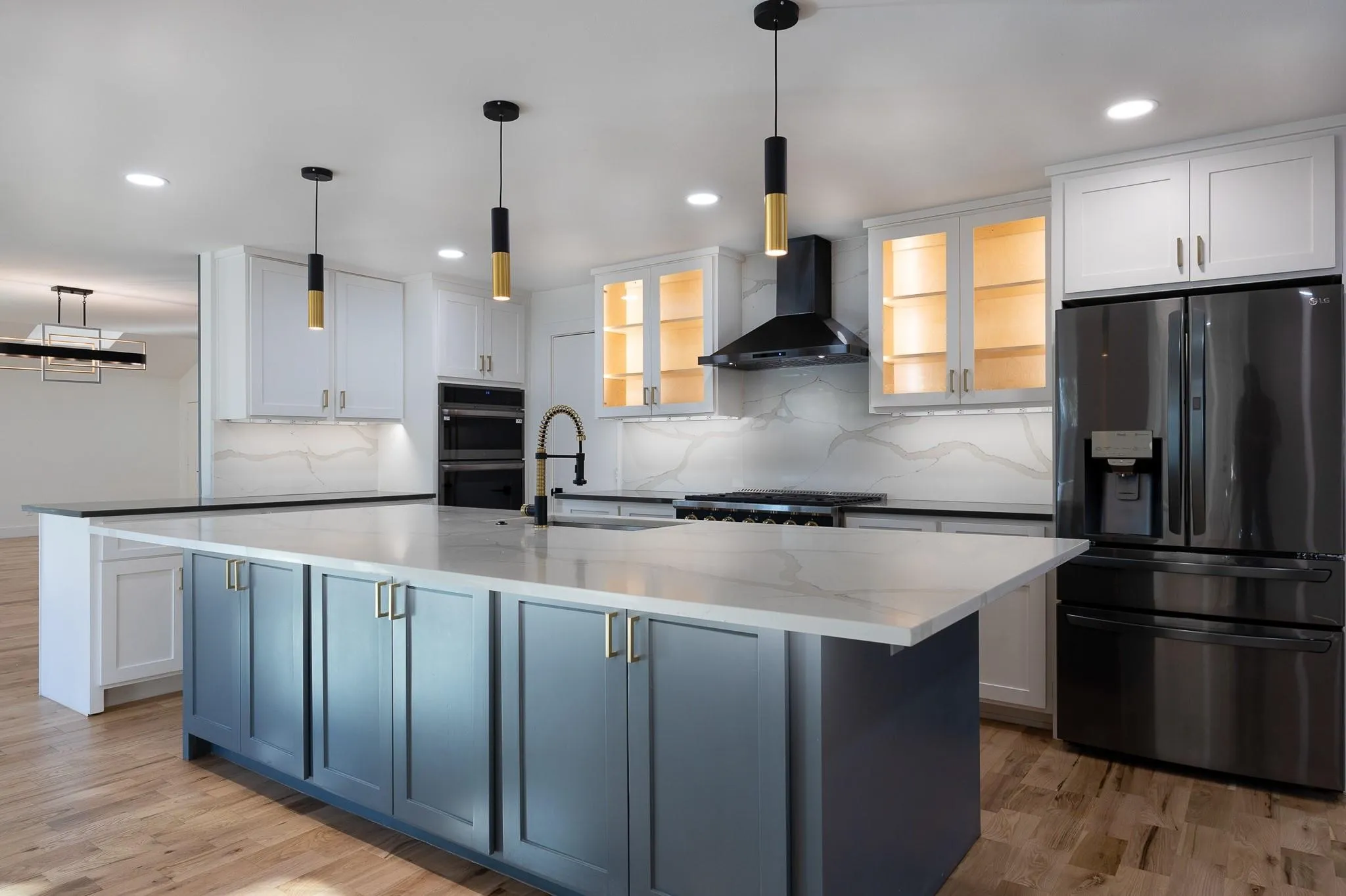 Navy island, quartz counters, and new stainless appliances