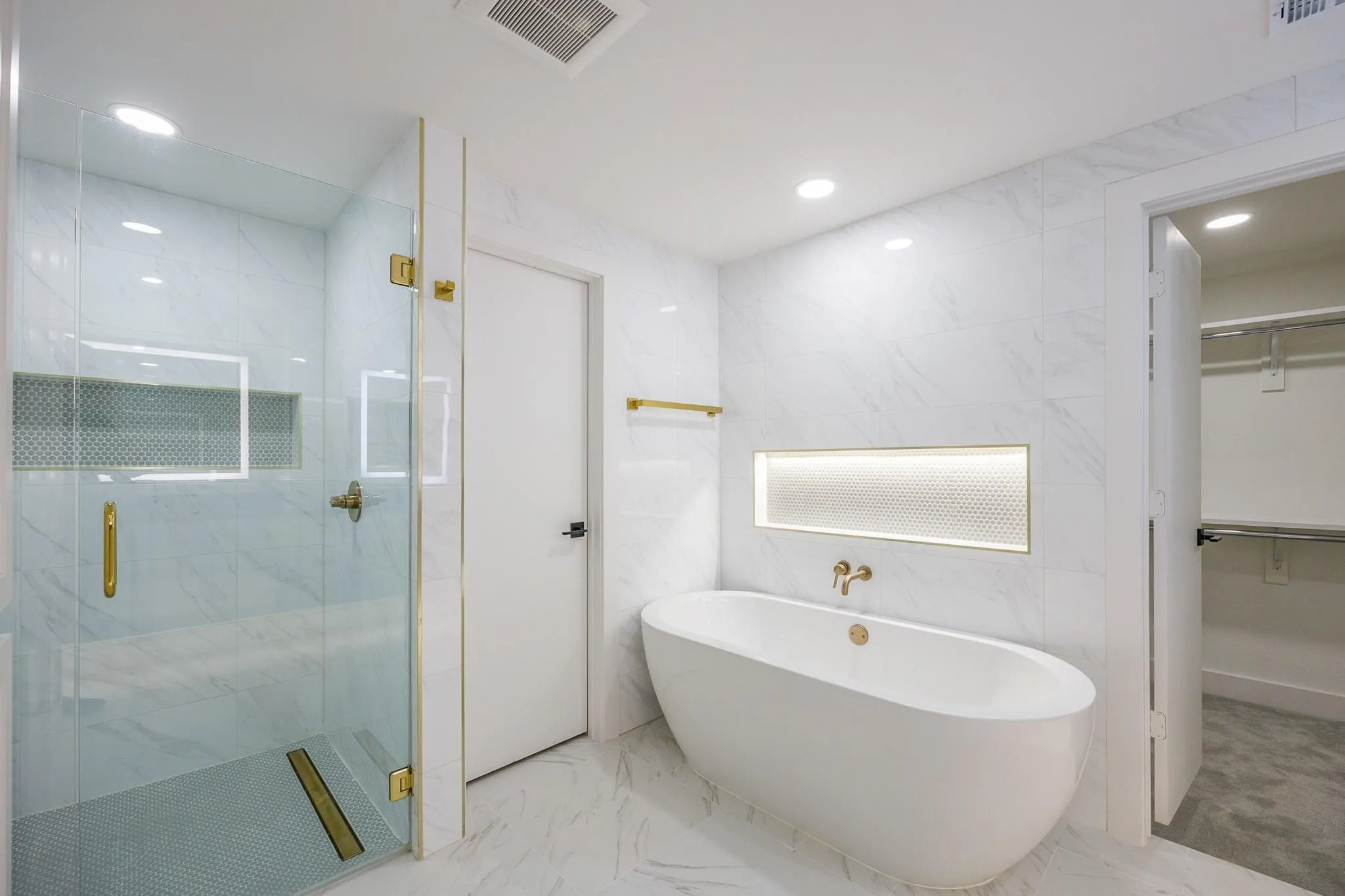 Primary bath: freestanding soaking tub and walk-in shower