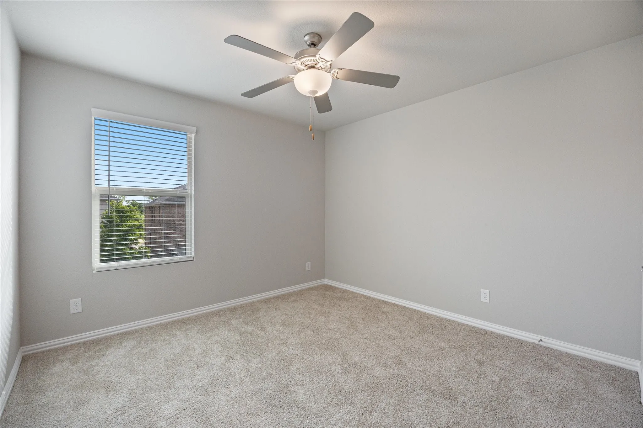 Secondary bedroom on the upper level.