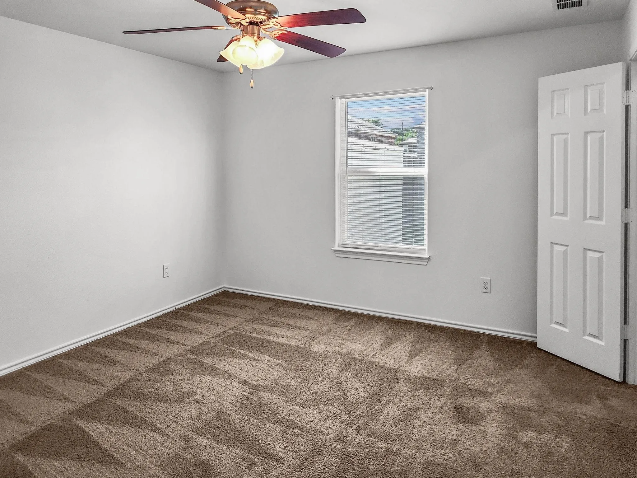 Another view of primary bedroom - Unit 821 - now has pergo-wood floors