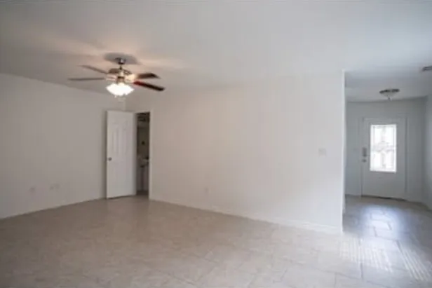 Living room and half bath - Unit 823