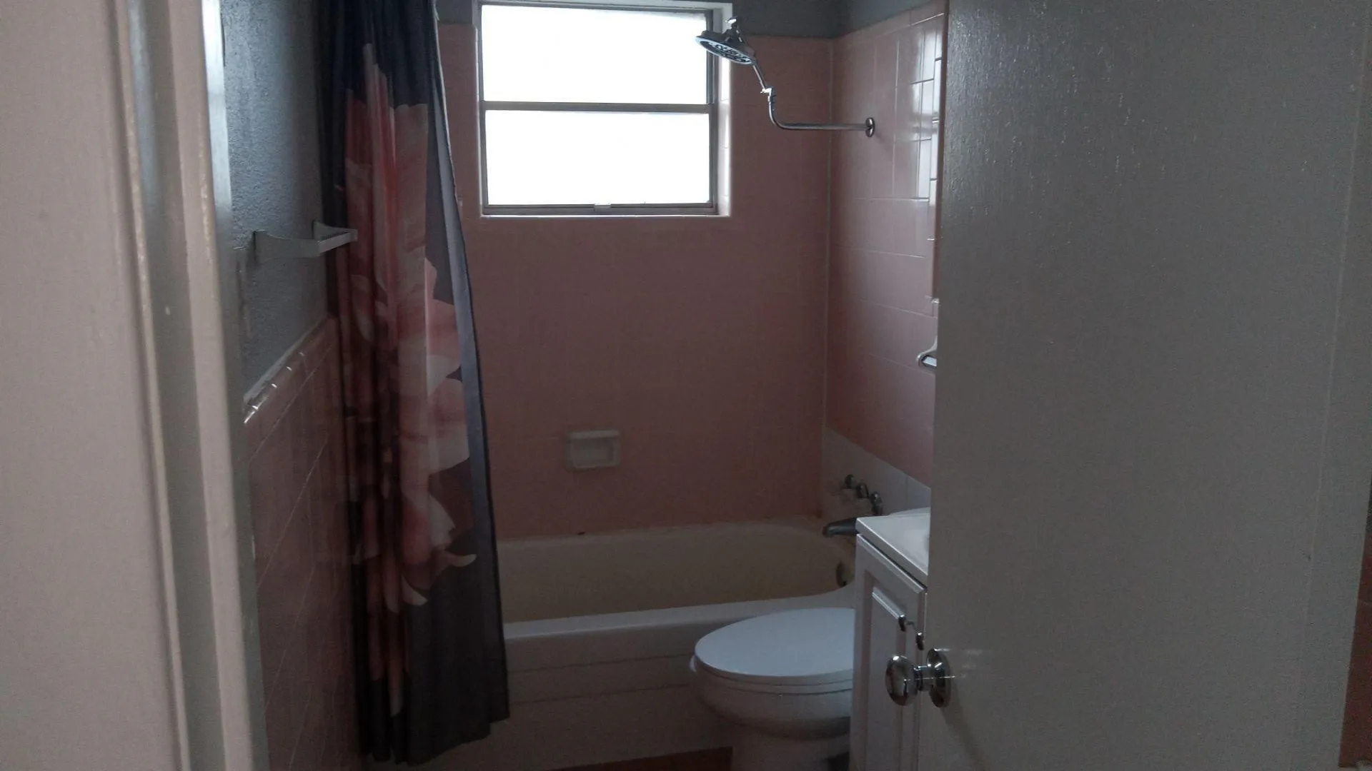 Full bathroom with vanity and shower / tub combo with curtain