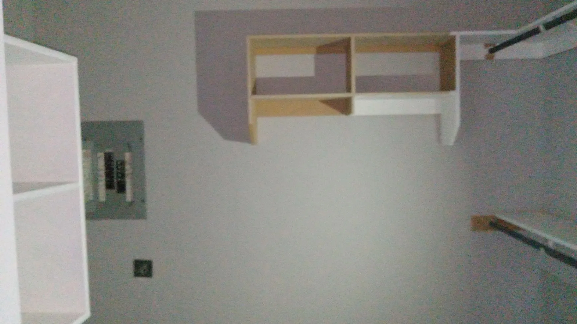 Walk in closet with electric panel