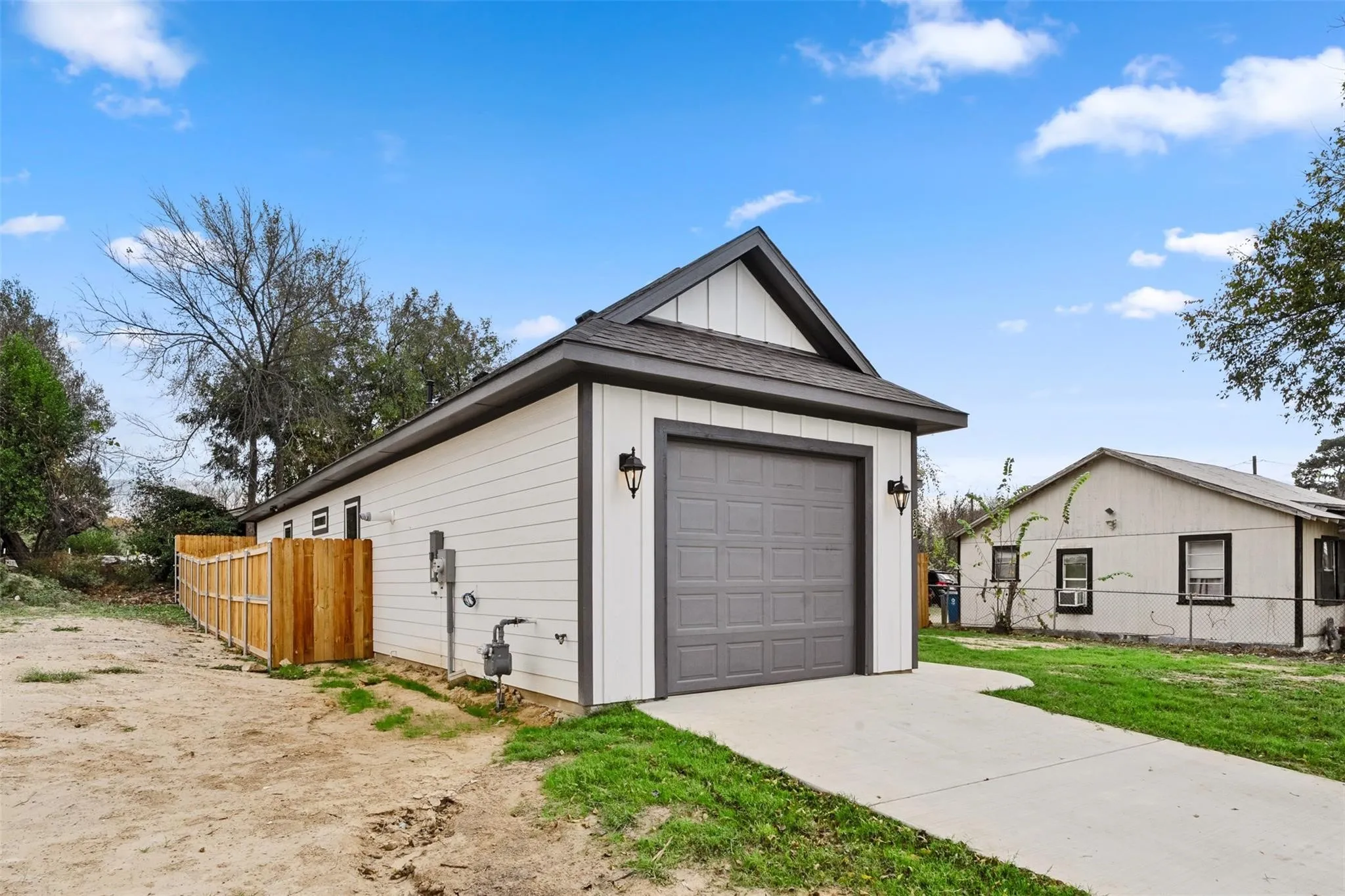 Garage featuring driveway