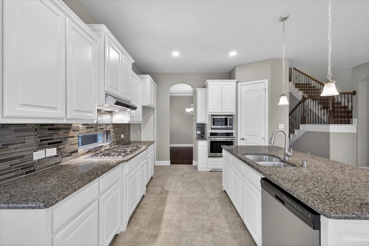 Kitchen is spacious plenty of cabinets