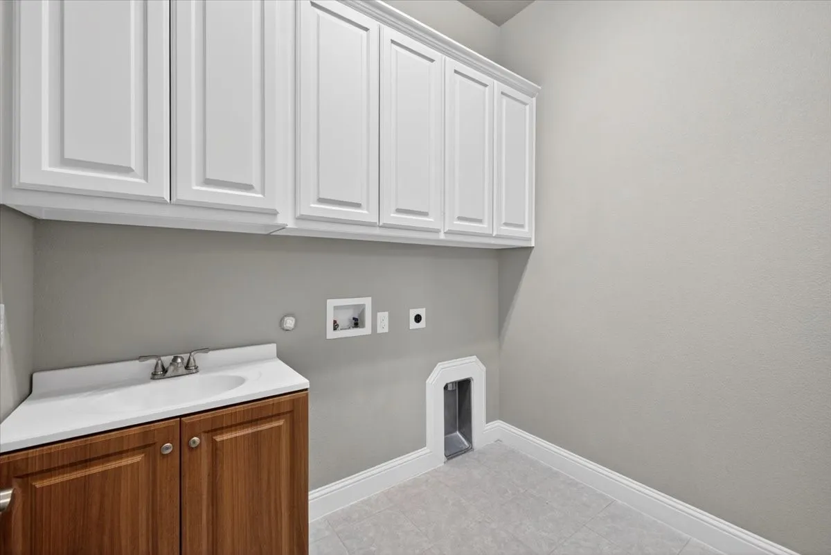 Full size washer and dryer along with hand sink
