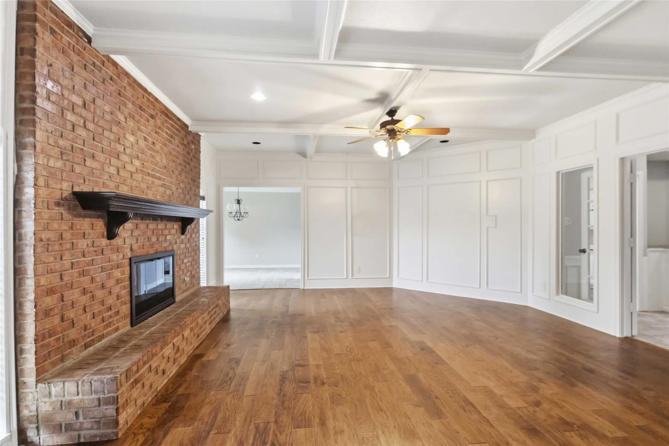 Open-concept living area at 200 Sunny Crest Dr, Murphy TX in the Timbers 3 community with natural light and spacious layout.